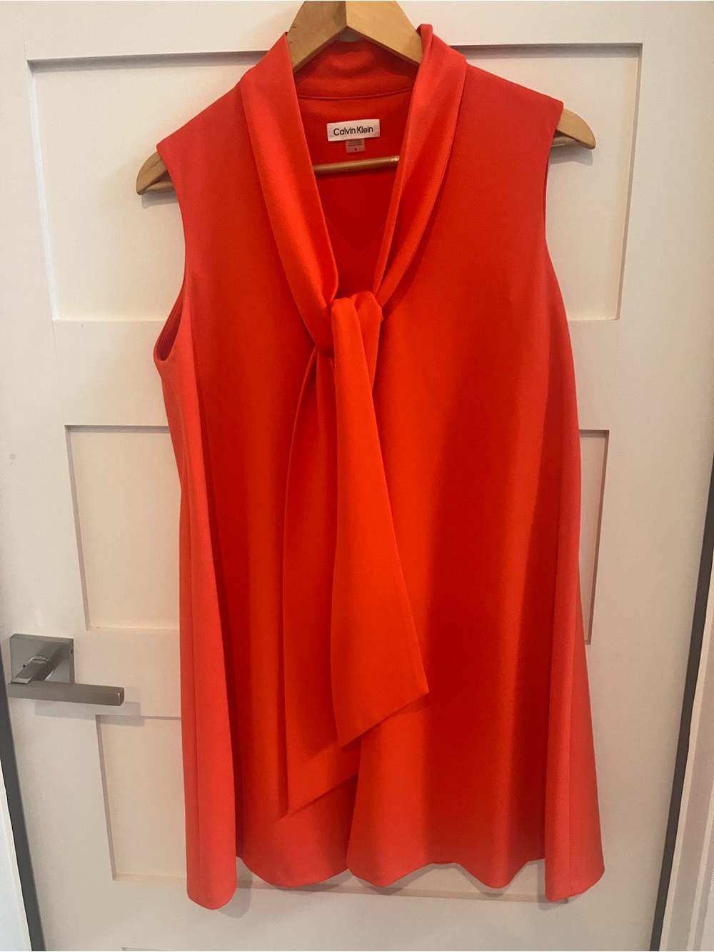 Calvin Klein Sleeveless V-Neck Blouse in Vibrant Orange-Red